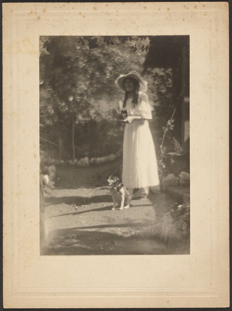 Woman with Camera and her Dog by Louis Fleckenstein
