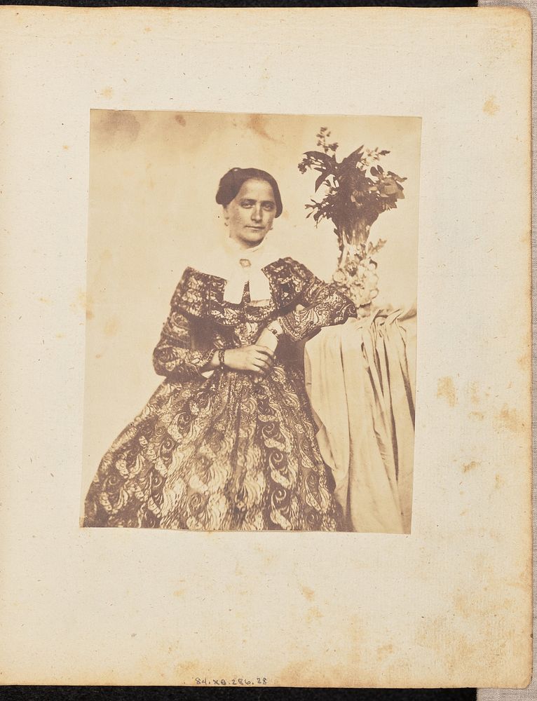 Portrait of a woman in a patterned dress by Jakob Höflinger
