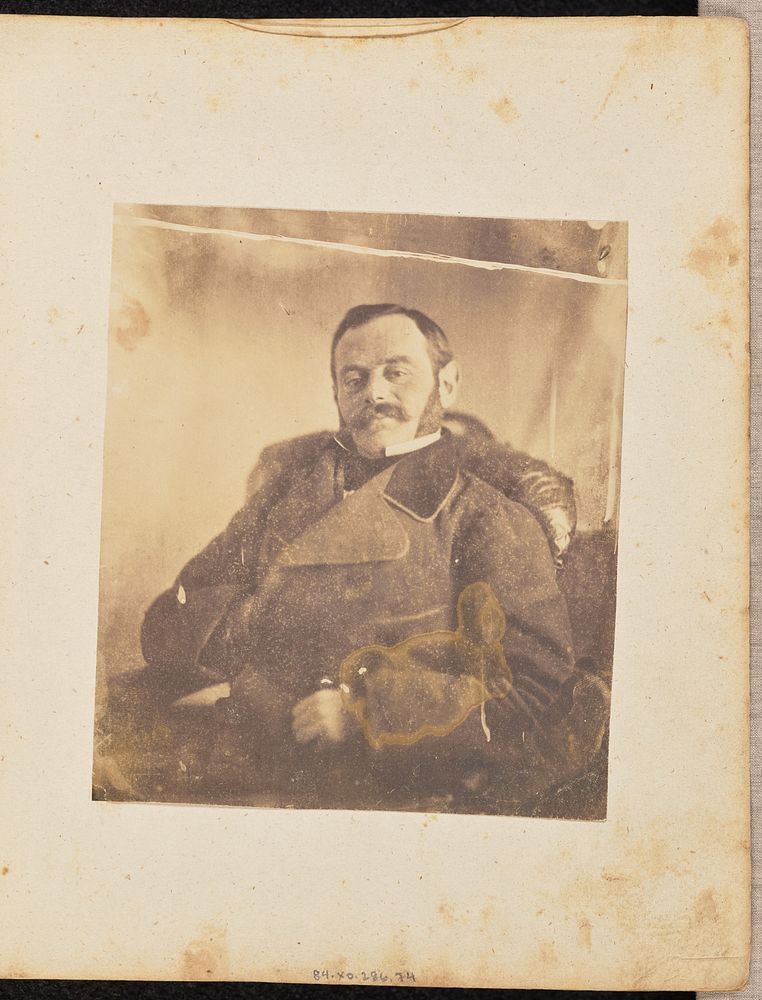 Portrait of a man in a leather chair by Jakob Höflinger