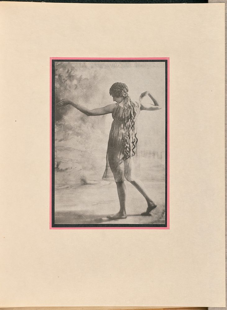 Female dancer as a nymph, touching one shoulder by Baron Adolf de Meyer