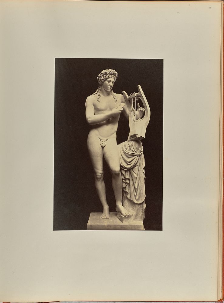 Statue of a nude male figure with a harp