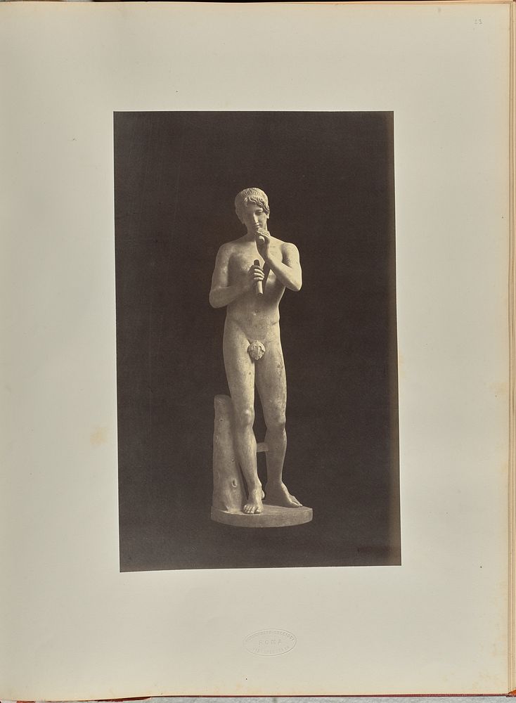 Statue of a nude male figure with a flute by Tommaso Cuccioni