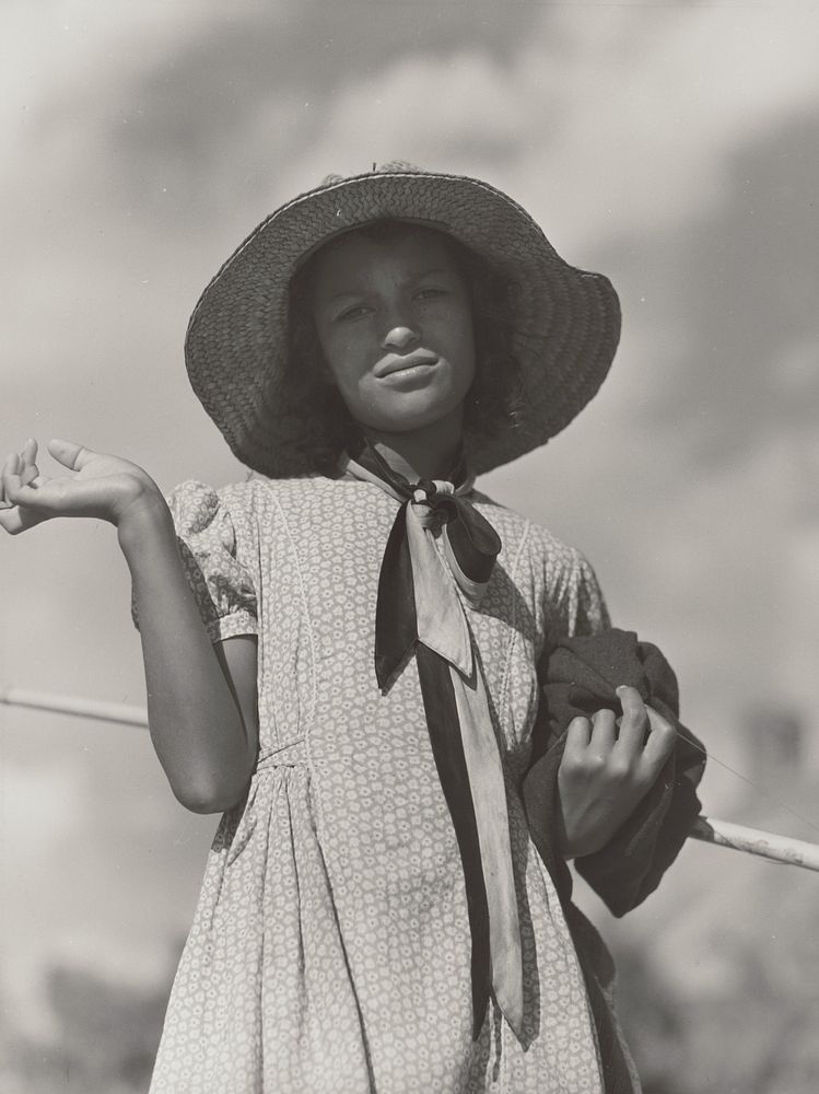 Daughter of a Cajun Family Returning Home after Fishing in Cane River, Melrose, Louisiana by Marion Post Wolcott