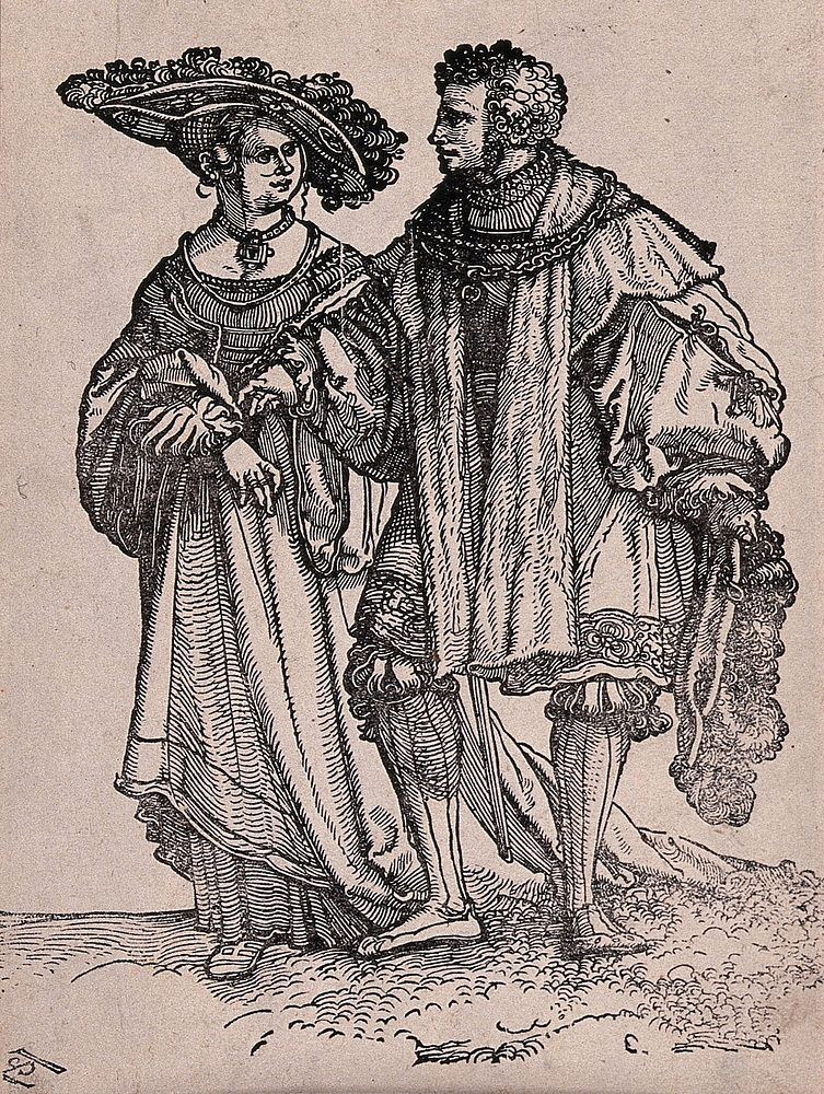 A couple in fashionable dress. Woodcut by Hans Schäufelein, 15--.