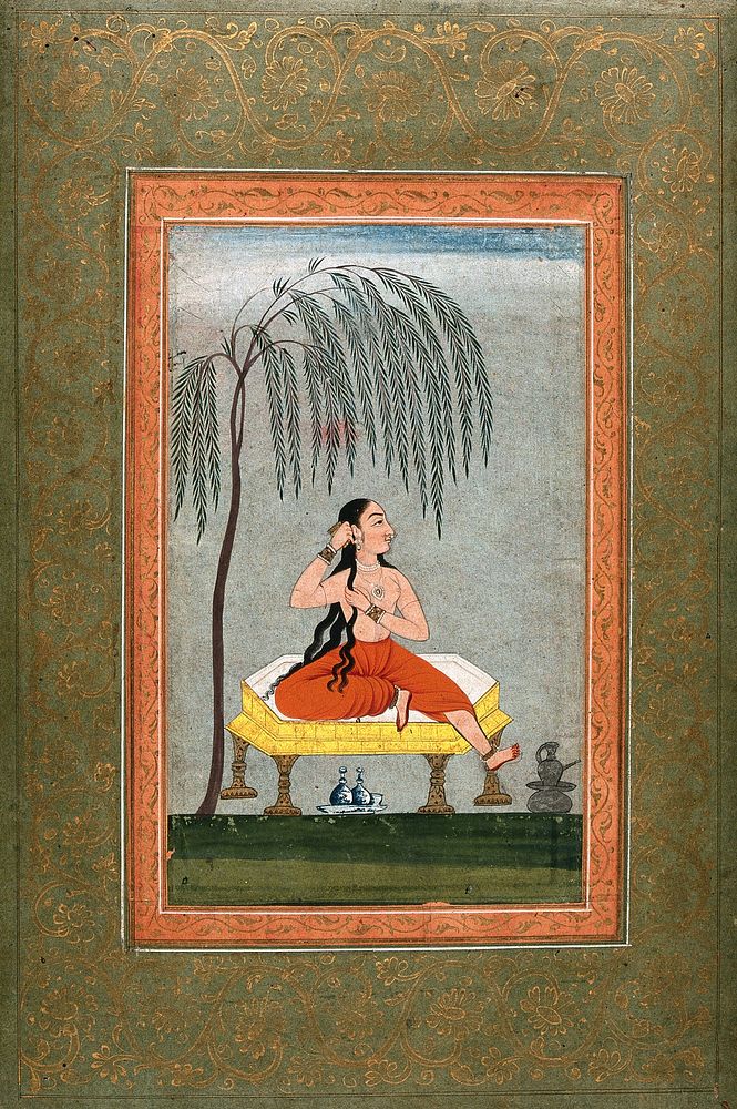 A courtesan at her toilette, seated under a tree. Gouache painting by an Indian artist, ca. 1800.