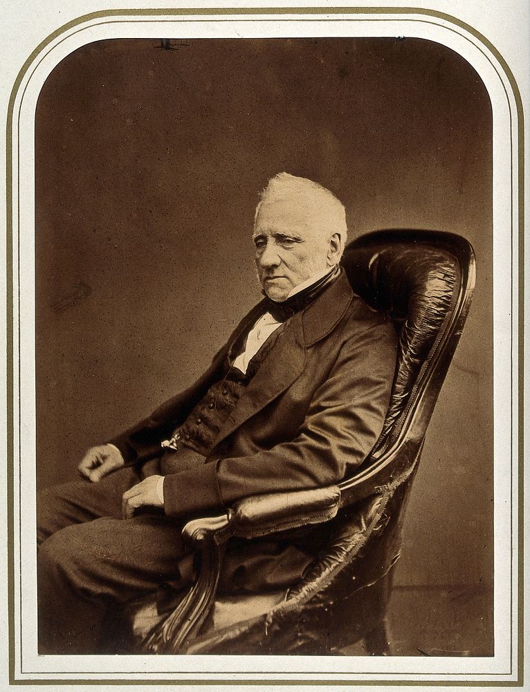 An unidentified man in an armchair. Photograph attributed to Maull & Polyblank.