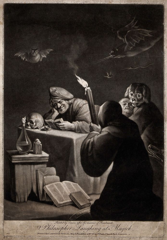 A man reading a grimoire, grinning; next to him a hooded man, kneeling on the floor, is holding a torch: they are conjuring…