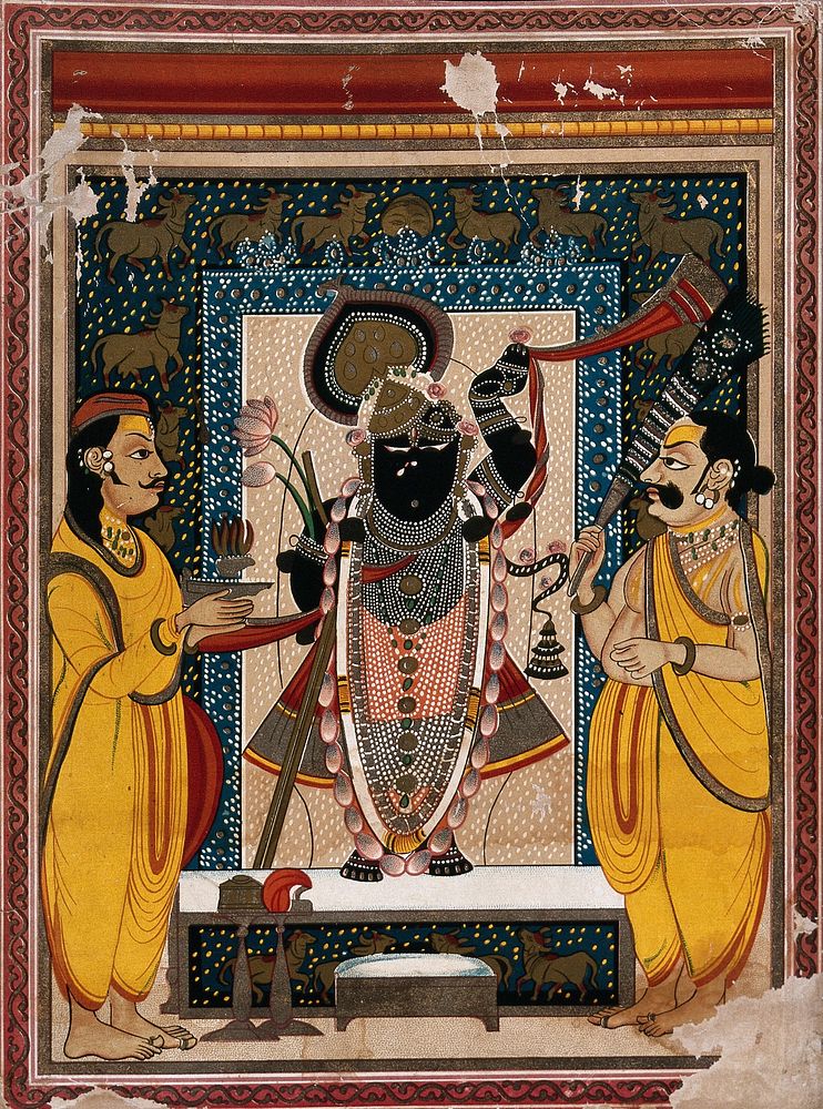 Krishna with two worshippers, as worshipped in Nathdwara, Rajasthan. Chromolithograph.