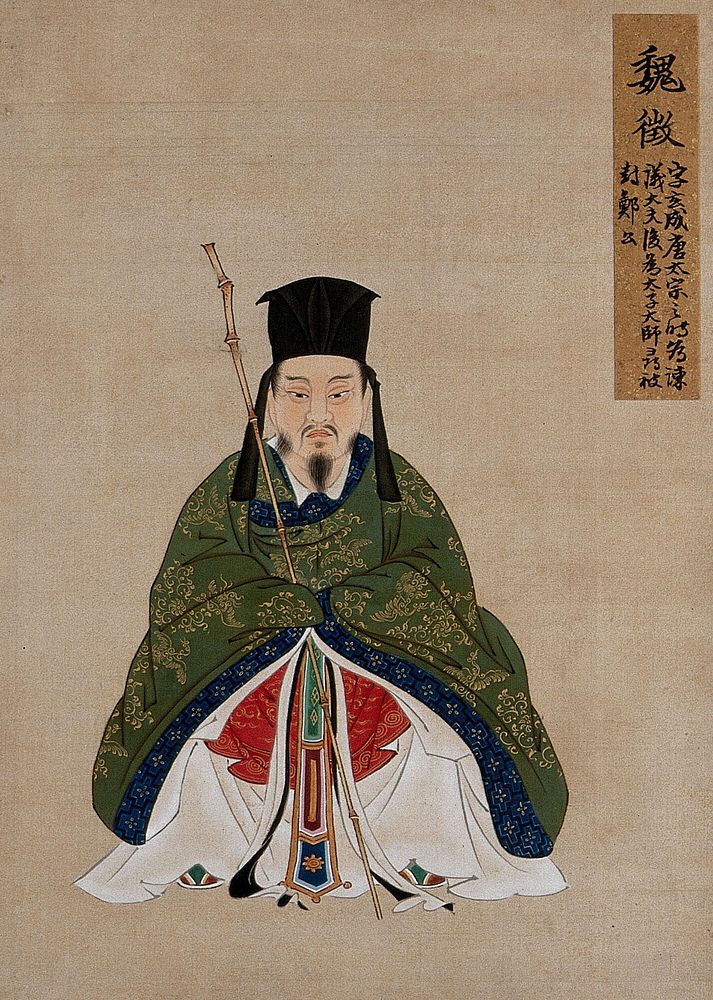 A Chinese figure, seated, with bamboo staff,wearing green robes with blue border and black hat. Painting by a Chinese…