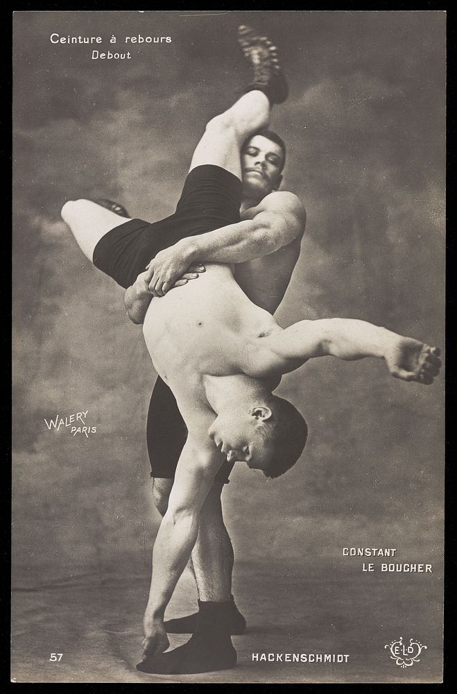 The wrestler Constant Lavaux "le Boucher" performing a wrestling move on George Hackenschmidt by holding him upside down.…