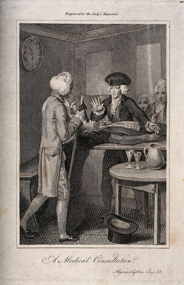 Two physicians in New England discussing the treatment of a patient with an injured leg who is lying on a wooden table.…