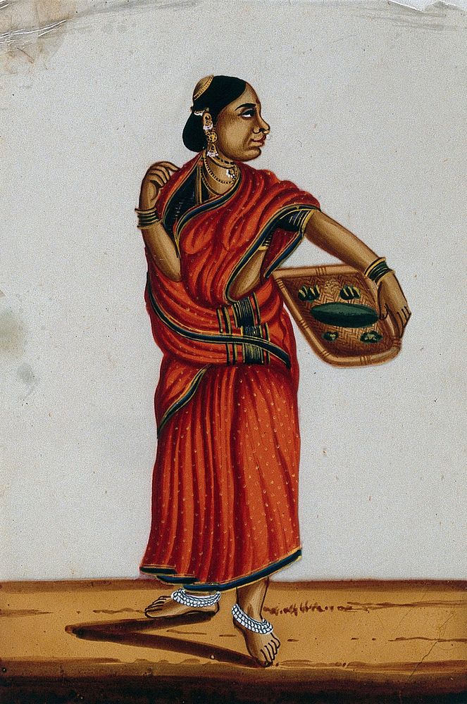 A Brahmin's wife holding a basket. Gouache painting on mica, by an Indian artist.