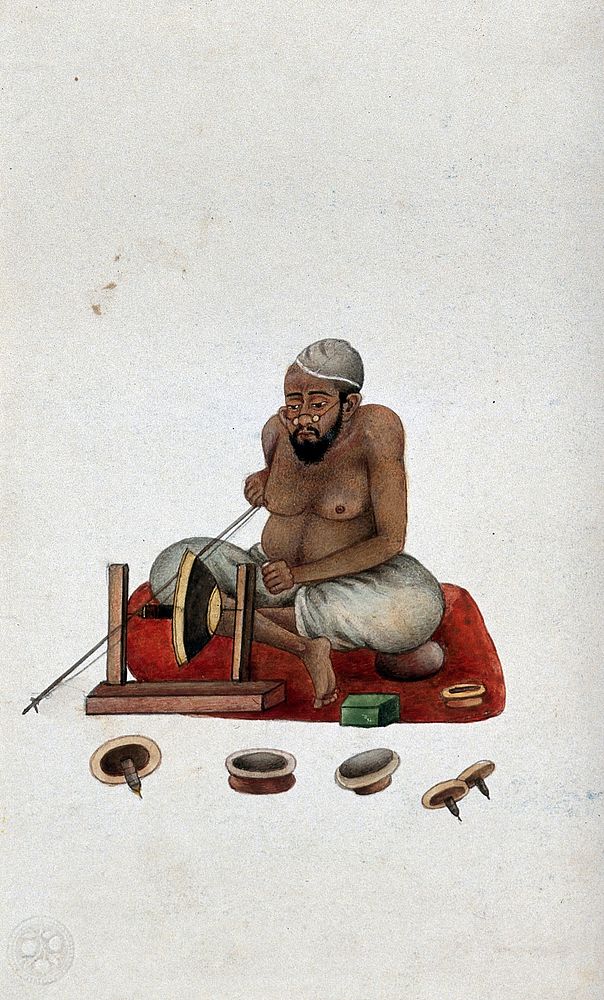 A lapidary at work cutting and polishing stones. Watercolour by an Indian painter.
