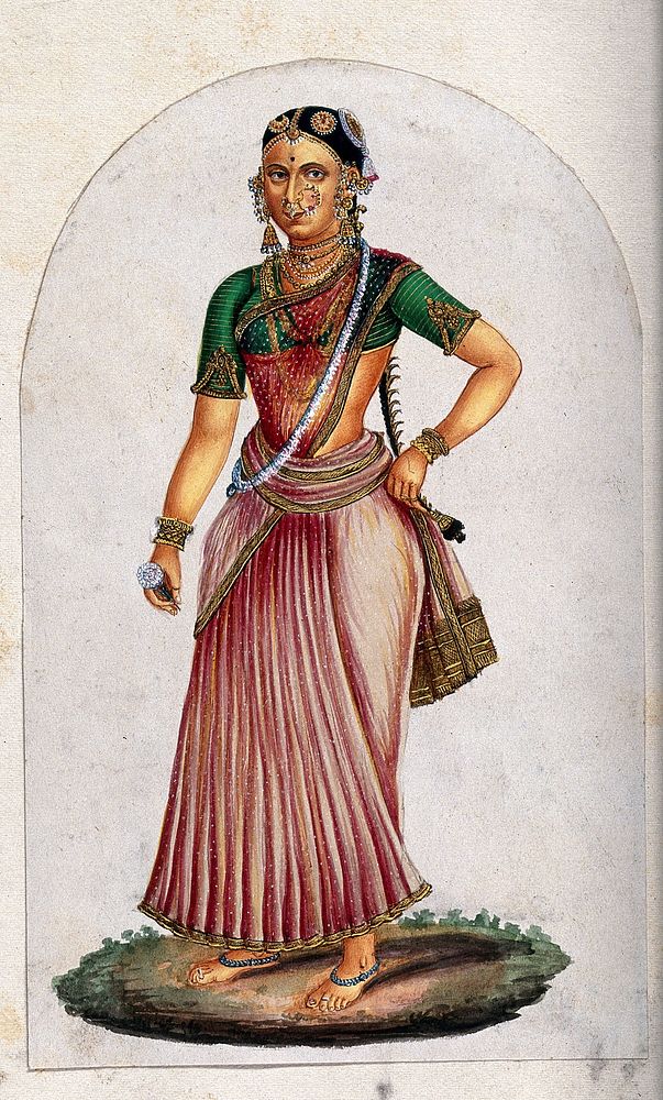 A Indian woman dancer, holding a flower in one hand. Gouache painting by an Indian artist.