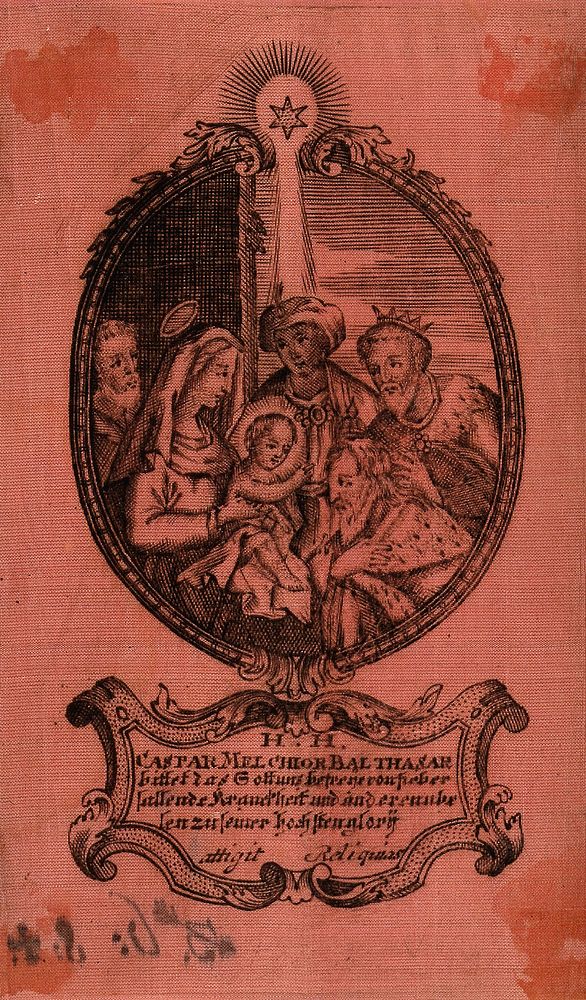 The adoration of the magi; with inscription of prayer against disease. Engraving on red silk.