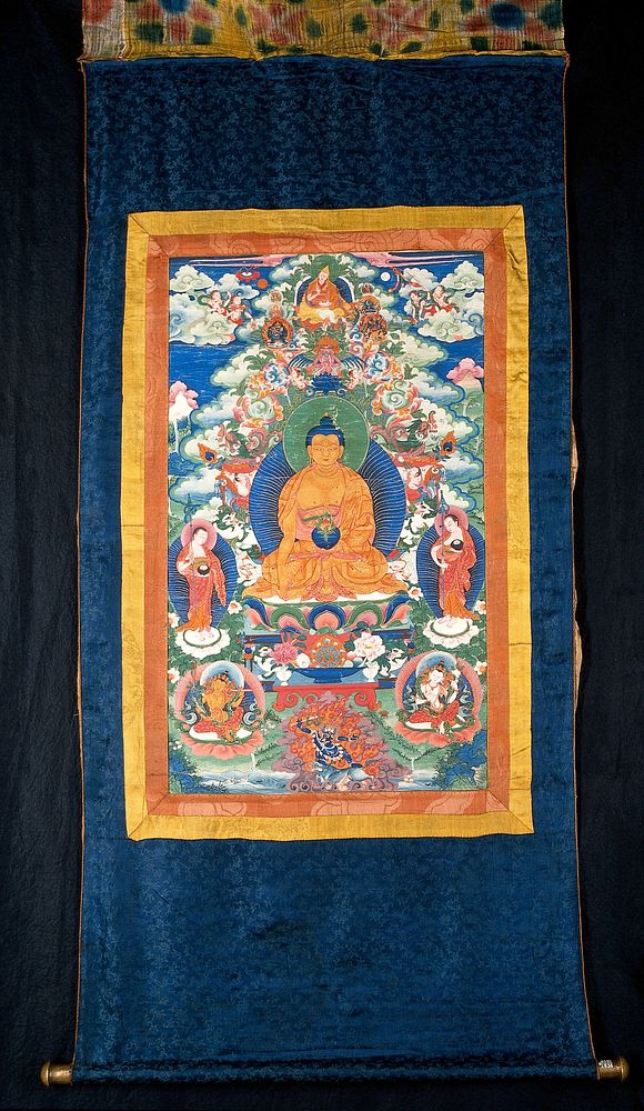 The medicine Buddha (Bhaiṣajyaguru) and Tsongkhapa (1357-1419). Distemper painting by a Tibetan painter.