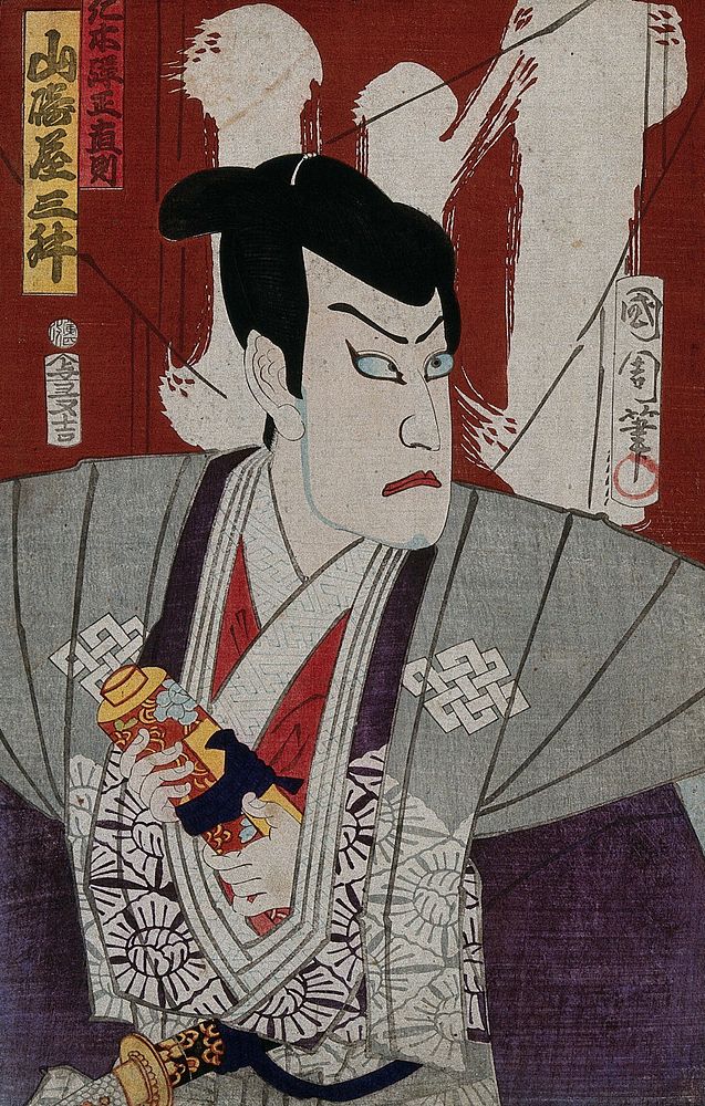 Yama...ya Mimasu as the villain Nikki Danjo, holding a scroll; with a stage curtain behind. Colour woodcut by Kunichika…