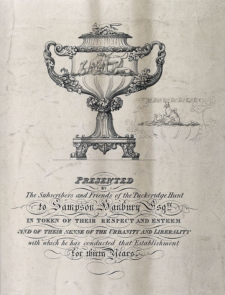 A hunting trophy showing hounds topped with a fox figurine. Engraving.