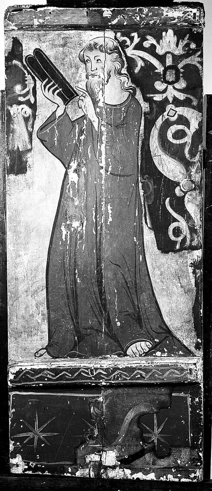 An evangelist (Saint Mark) holding a book, whole length to left. Tempera painting by a Spanish painter, 14th century.