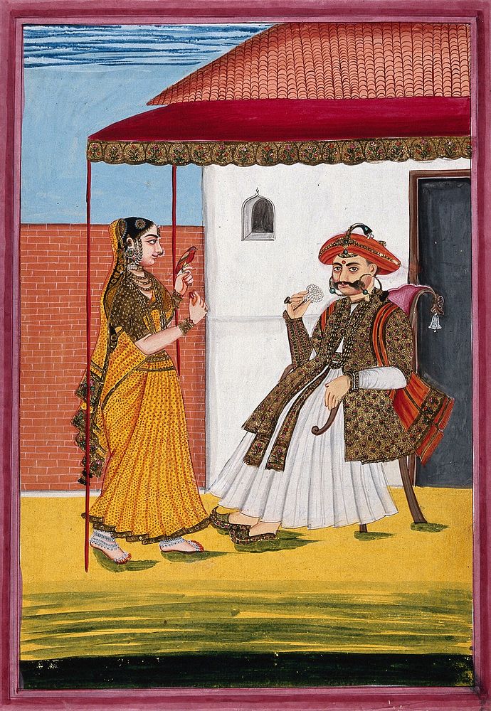 A Maratha man, richly dressed, seated under a canopy enjoying the scent of a white rose, with a woman on the left holding a…