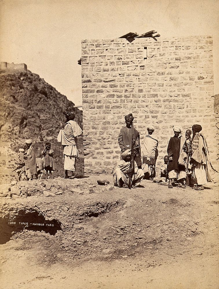The Khyber Pass, Pakistan: men in a group with rifles. Photograph, ca. 1900.