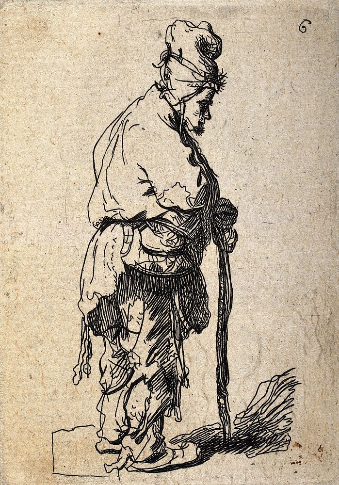An old man dressed in rags with a hat made from rags holding a stick with both hands. Etching.