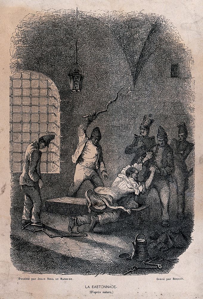 A manacled prisoner is stripped to the waist and restrained by prison warders while he is beaten with a lash. Wood engraving…