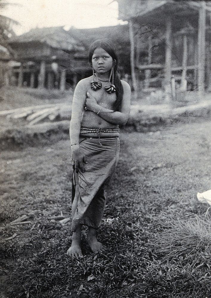 Sarawak: a Kayan girl. Photograph.