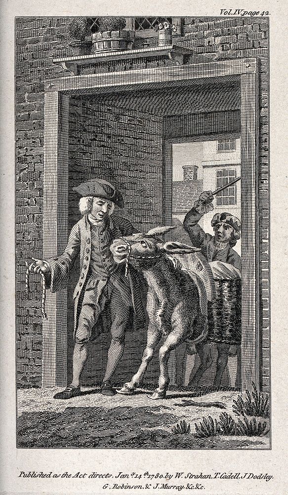 A man is trying to persuade a donkey with kindness to pass a gate while another man hits the back of the animal with a…