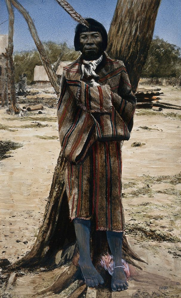 Gran Chaco, South America: a medicine man of the Lengua Indians. Coloured photograph, ca. 1913.