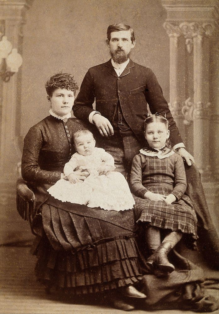 Rev. George Theodore Wellcome and family. Photograph by Eldridge, Mankato.