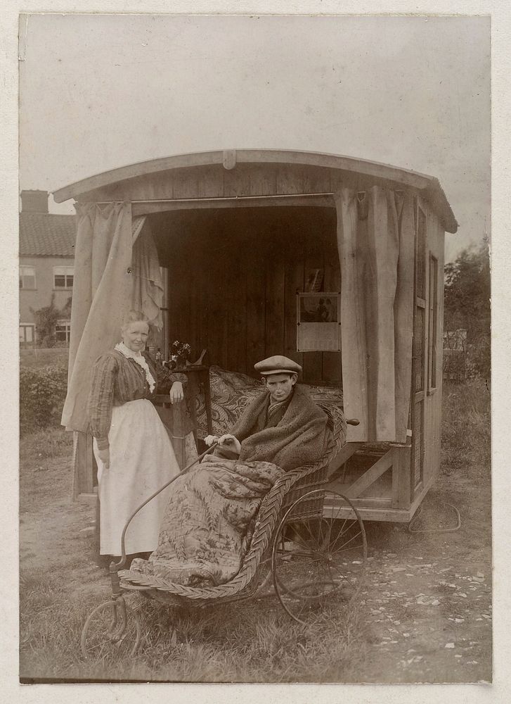 An invalid boy in a Bath chair outside an open air sleeping-chalet. Photograph by W. Ames, ca. 1900.