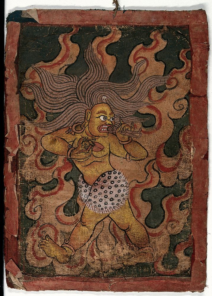 A red and yellow Tibetan demon, surrounded by flames, about to gobble a man. Gouache painting by a Tibetan artist.