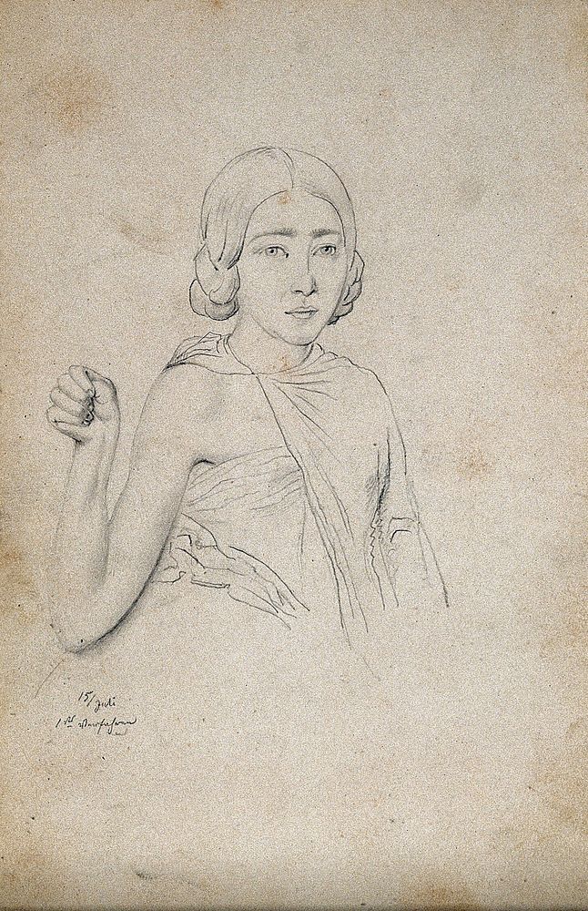 A young woman, viewed from the front who has her right shoulder exposed, and her right arm raised with a clenched fist.…