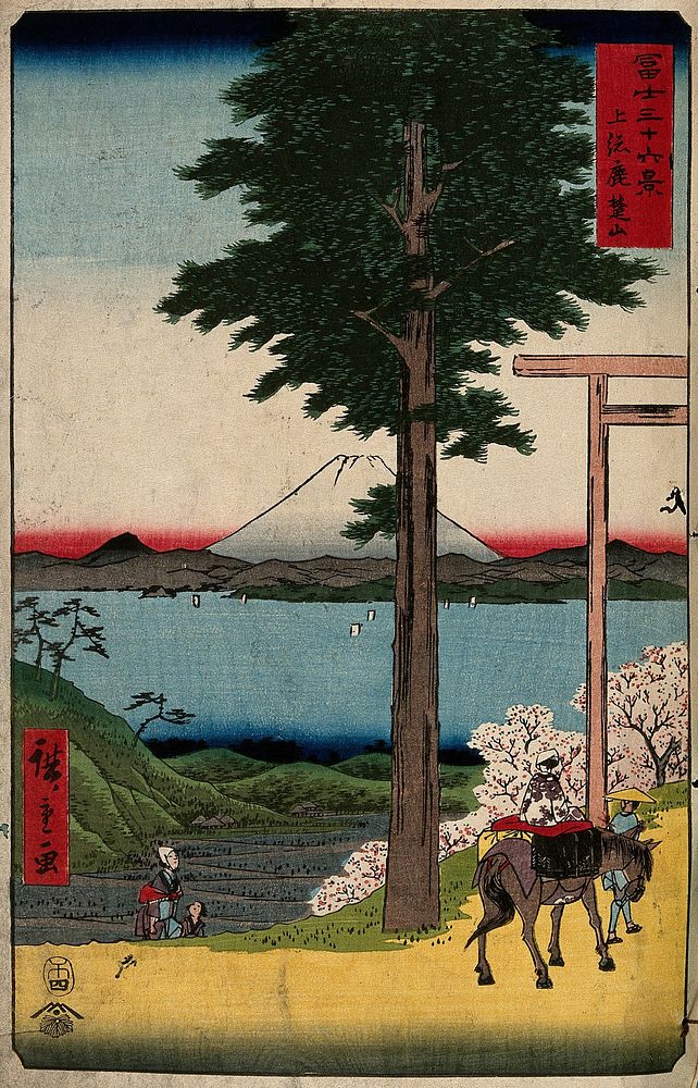 Fuji seen from Kazusa province across the bay from Edo; a woman is led on horseback through a shinto gate. Colour woodcut by…