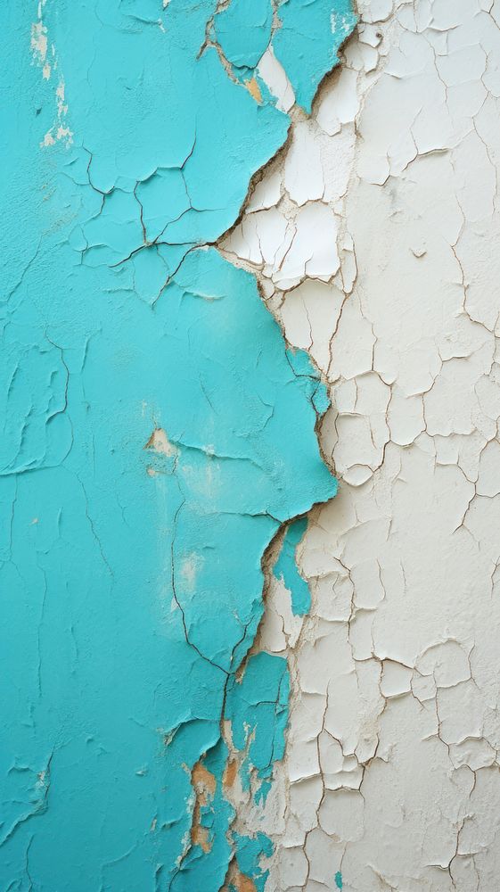 White and turquoise rough paint wall.