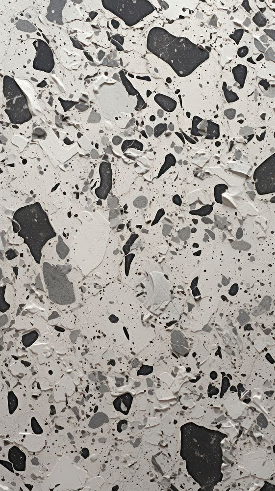 Black and white terrazzo with some paint on it floor wall architecture.