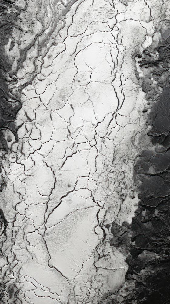 Black and white abstract pattern with some paint on it outdoors nature ice.