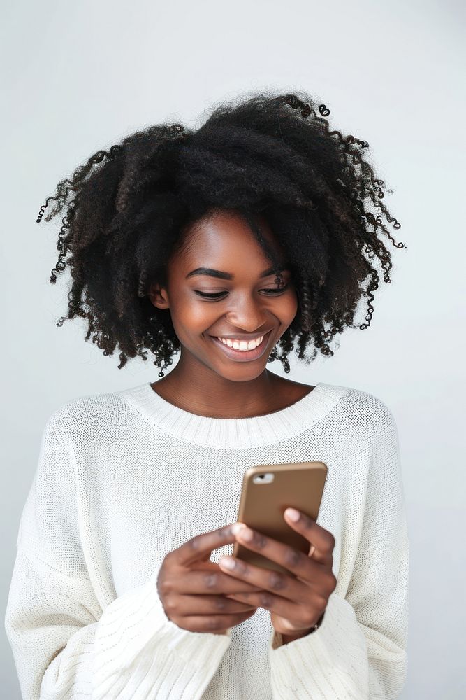 African woman holding cellphone smiling smile adult.