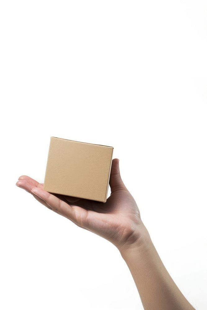 Hand hold beige card box cardboard paper white background.
