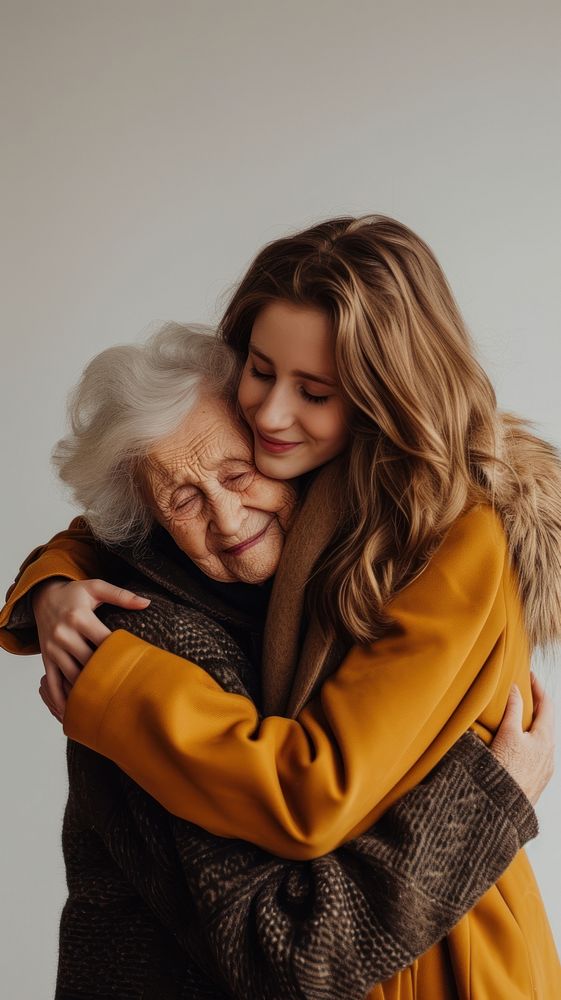 Daughter embrace old mother portrait hugging adult.