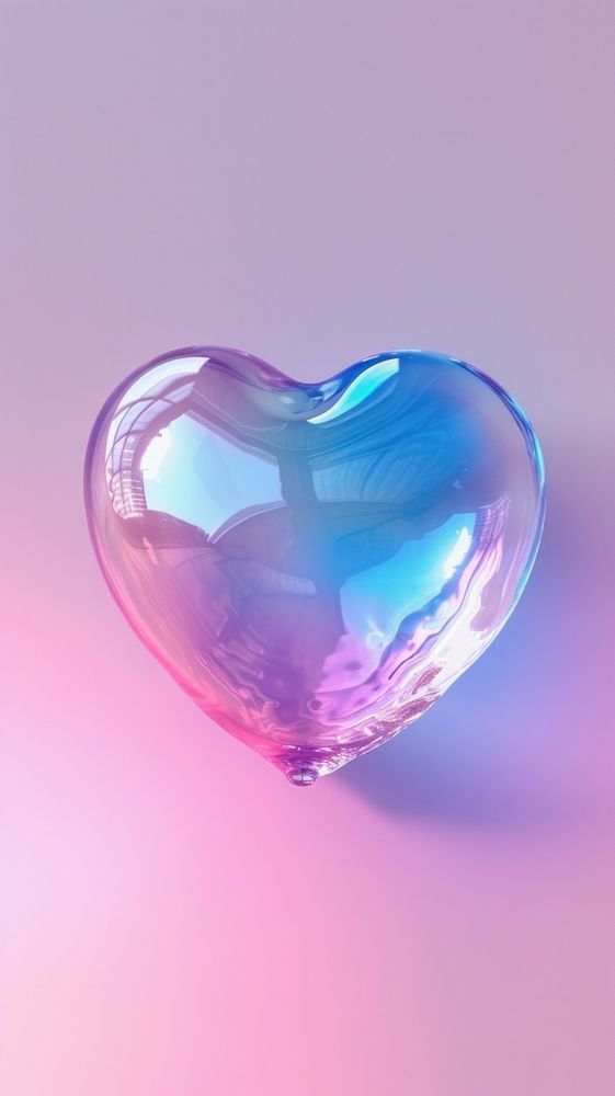 Light pink blue heart gemstone glowing jewelry.