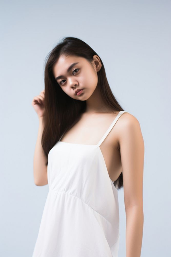 Teen woman wearing blank white short slip dress fashion portrait adult.