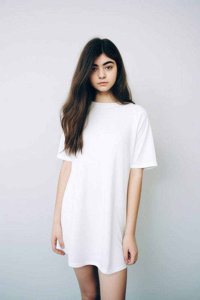Teen woman wearing blank white short stretch knit dress fashion portrait sleeve.