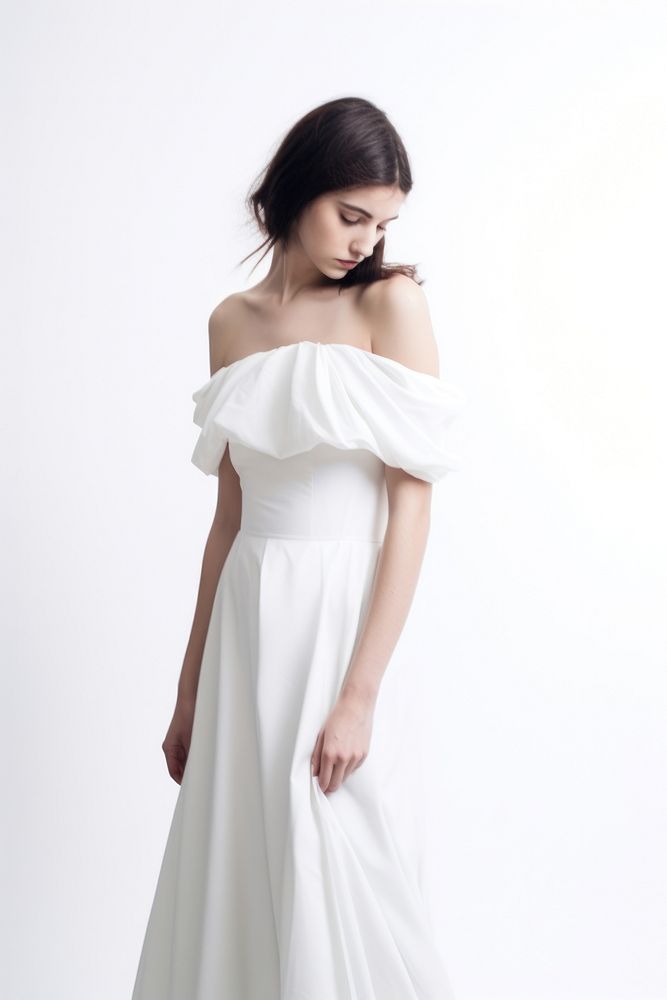 Woman wearing blank white off-the-shoulder dress with gathered detail portrait fashion wedding.