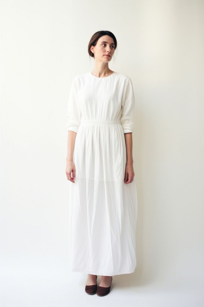 Woman wearing blank white smocked-waist textured dress fashion sleeve adult.