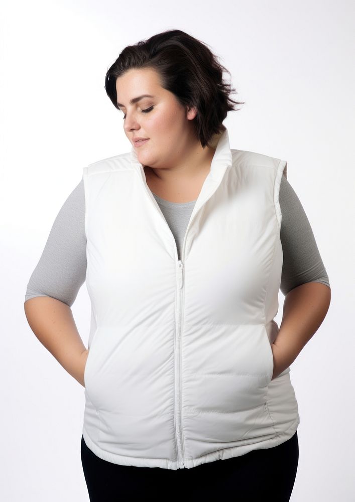 Plus size woman wearing blank white rubberised short gilet adult white background contemplation.