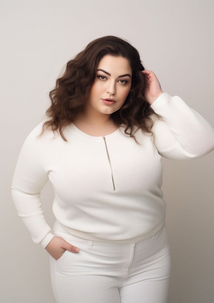 Plus size woman wearing blank white crop knit sweater with zip portrait sleeve blouse.