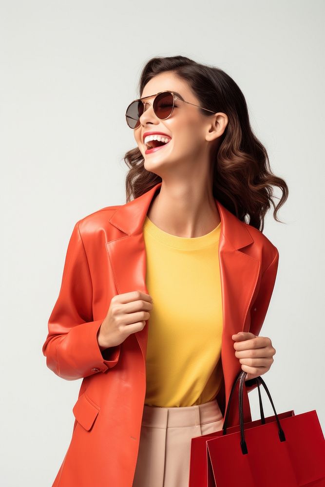 Cheerful happy woman enjoying shopping cheerful handbag jacket.