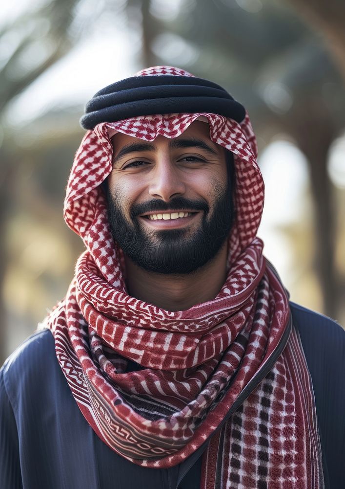 Middle Eastern man clothing smiling scarf.